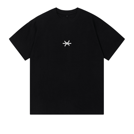 Ominous Ascendance Heavyweight Tee - Front of the black t-shirt showing a small 'Ominous' brand logo positioned in the upper center