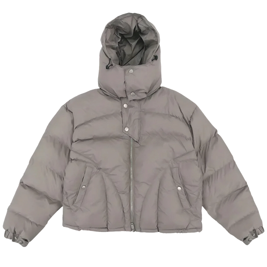 Ominous Angular v-taper puffer jacket in concrete gray khaki with a hood, featuring split joey pockets, metal zipper, and button popper adjustable cuffs.